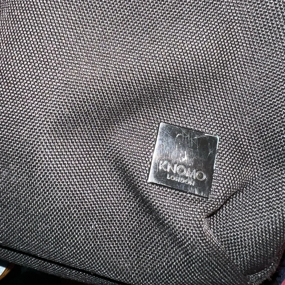 KNOMO Black Unisex Laptop Briefcase Messenger Bag with many compartments.
